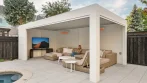 White aluminum louvered pergola beside a pool spa with privacy walls and an outdoor living room inside